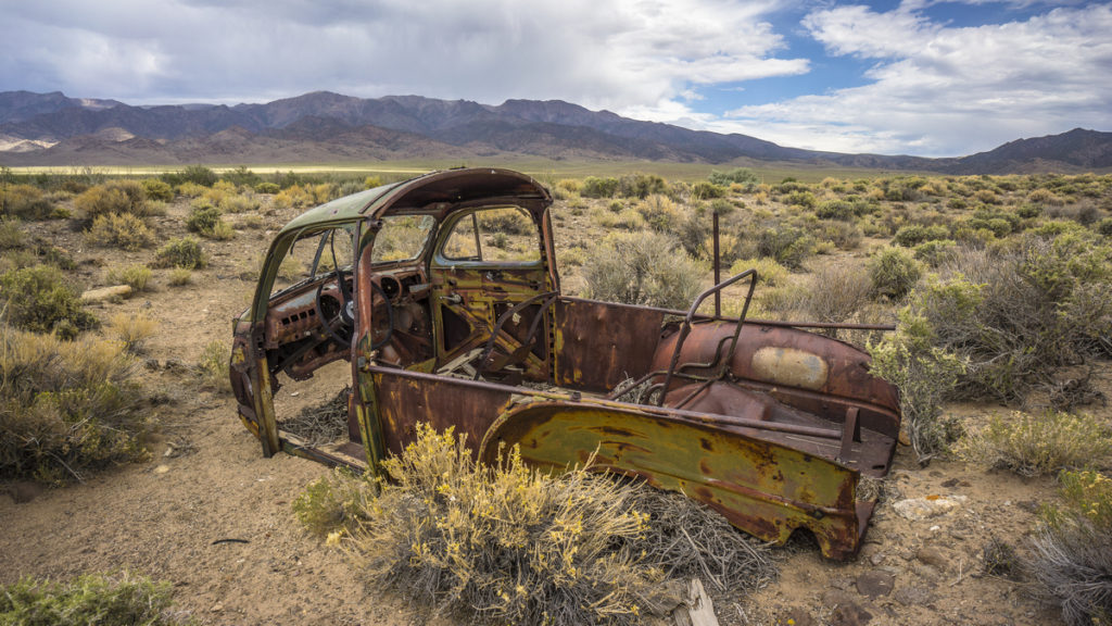 antique old truck abandoned in the nevada desert along the basin and range trail 